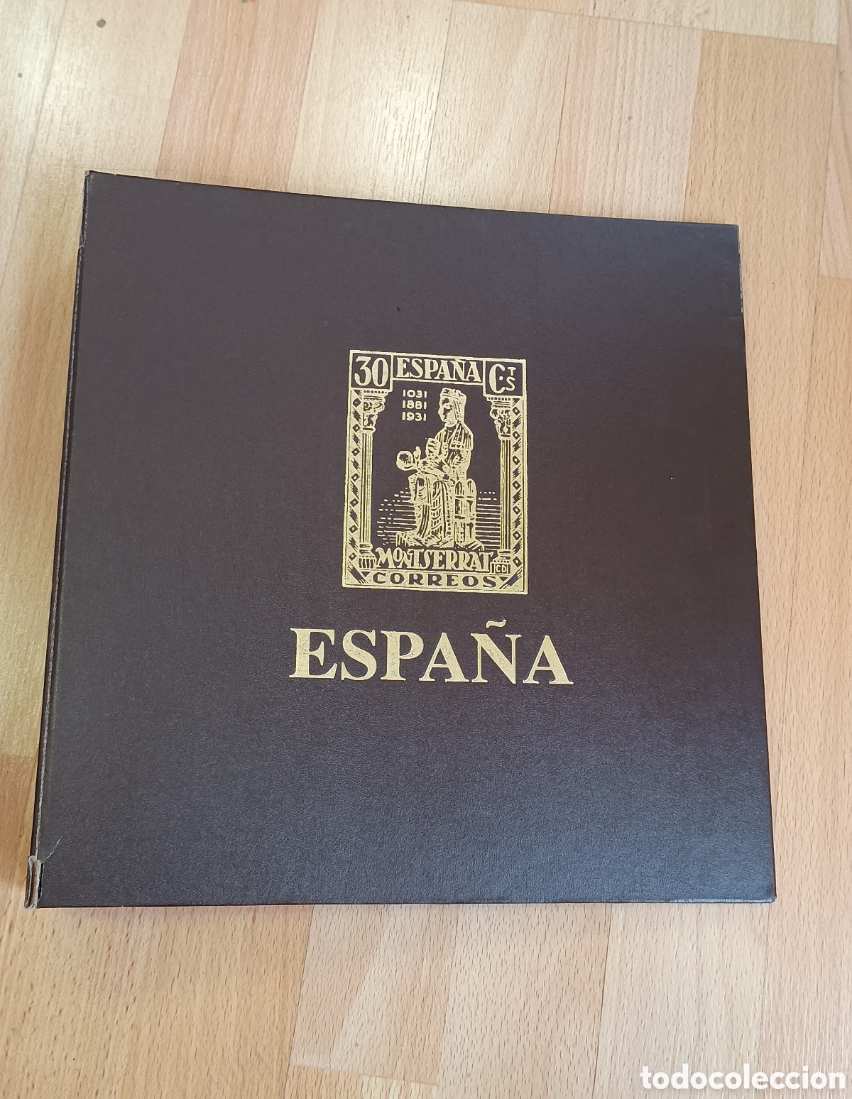 Sellos: TAPA DE &Aacute;LBUM DE SELLOS CON CAJET&Iacute;N - MARCA OLEGARIO - T&Iacute;TULO ESPA&Ntilde;A - COLOR MARR&Oacute;N
