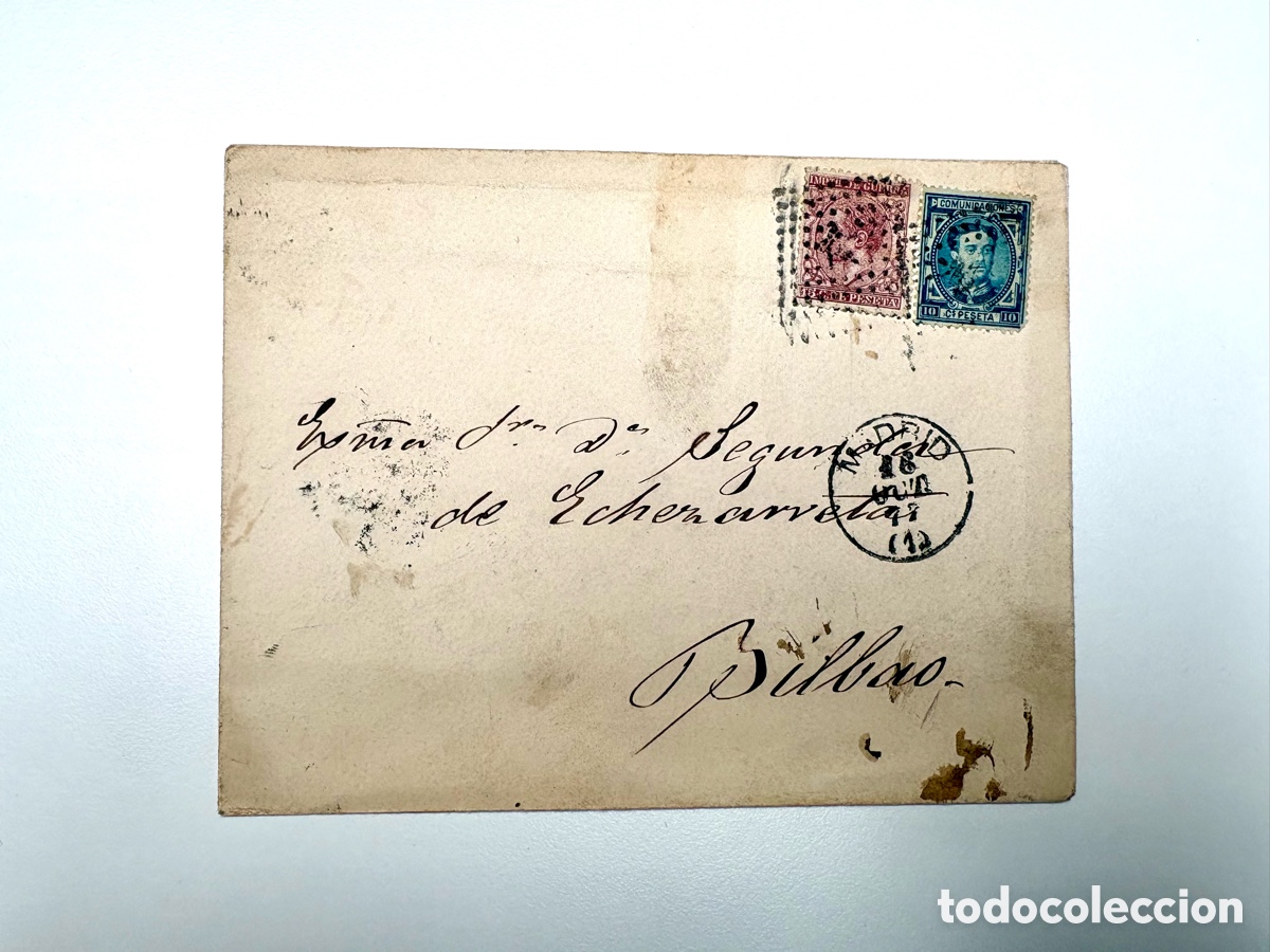 Timbres: Sobre circulado de Madrid a Bilbao (1877) con franqueo de Alfonso XII e Impuesto de Guerra