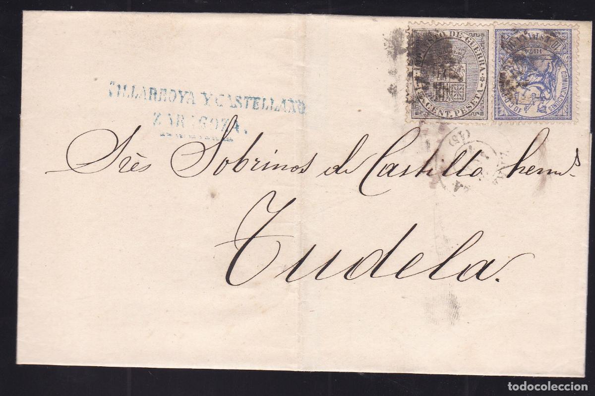 Sellos: F16-76-Envuelta ZARAGOZA-TUDELA 1874. Marca Villarroya y Castellano. Impuesto Guerra