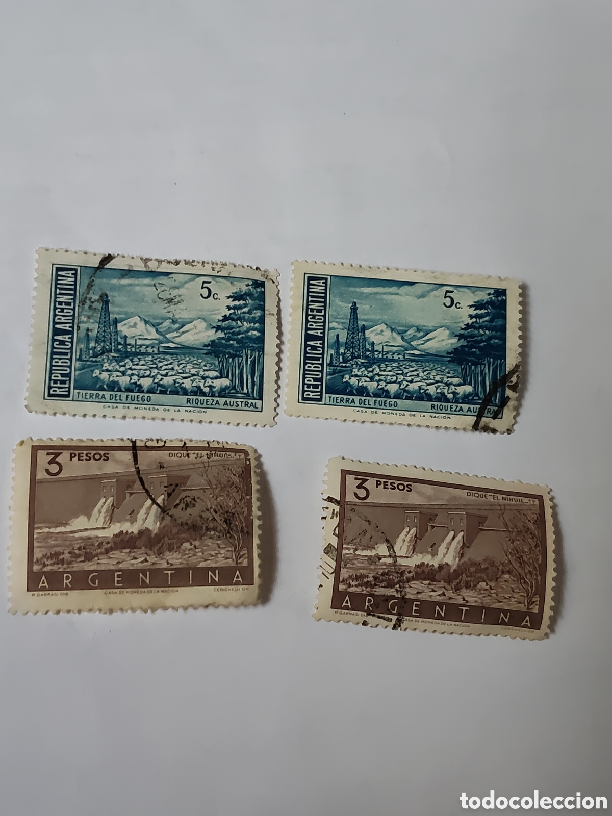 Sellos: 4 sellos de Argentina Tierra del fuego Riqueza Austral 1970-72 y Dique el Nihuil 1954-58 en Mendoza