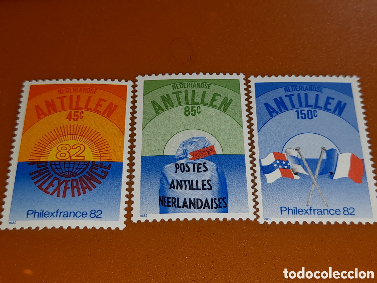Sellos: Sello Antillas Holandesas nuevo 1982. Exp Filt Inter. Philexfrance, 82. Bandera. Globo. Sol. Saca. S