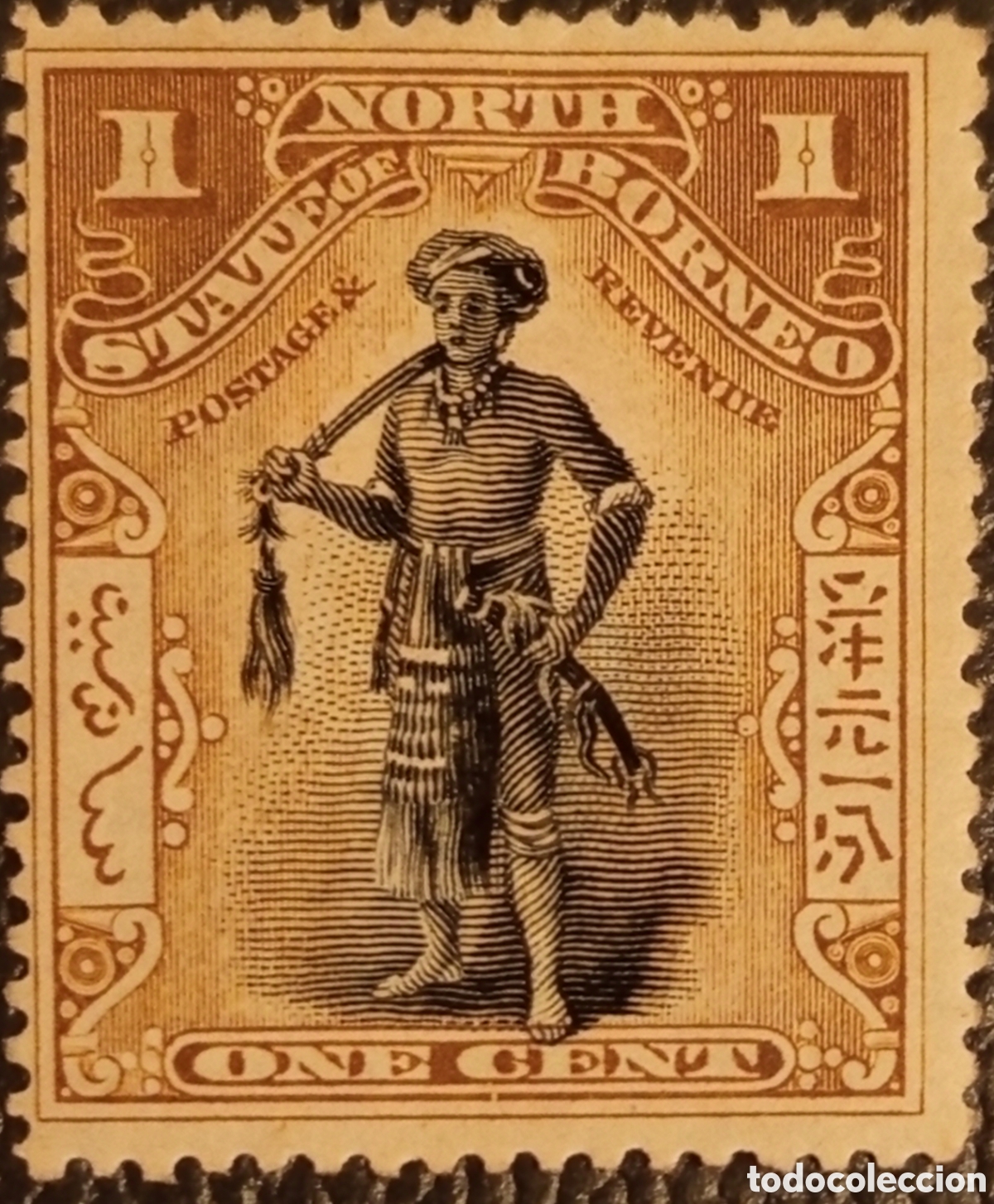 Sellos: Sello Borneo del Norte 1897 - Jefe Dyak 1c (Negro y Ocre) - MH (Scott #79 / SG #92a)