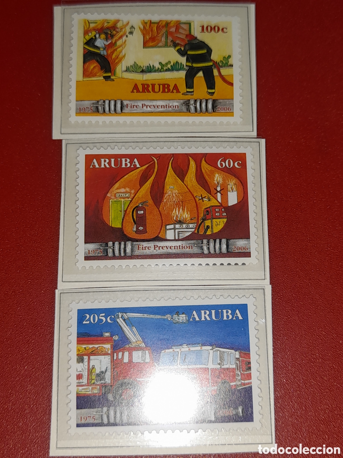 Sellos: Sello Aruba nuevo 2006. Bomberos. Trabajo. Fuego. Cami&oacute;n. Escalera. Uniforme. Extintor. Ambulancia.