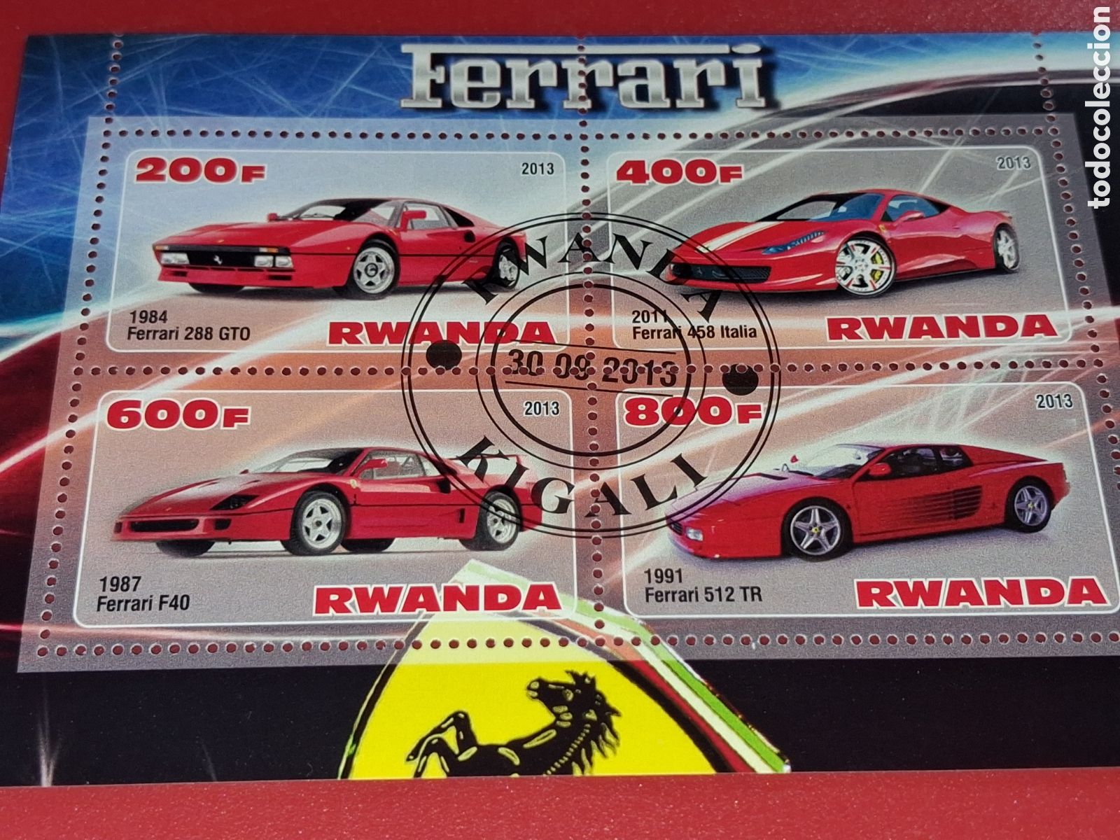 Sellos: HB Ruanda mtdo 2013. Coches. Ferrari. Autom&oacute;viles. Veh&iacute;culos. Carreras. Deporte.