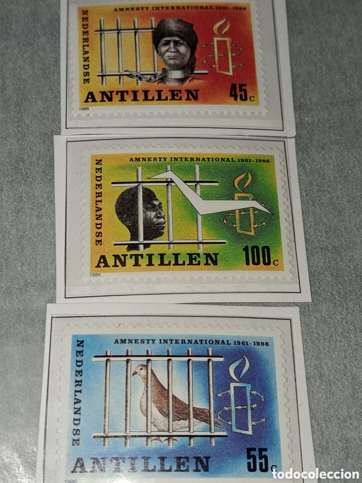 Sellos: Sello Antillas Holandesas nuevo 1986. 25Aniv amnistia inter. Paloma. Aves. Carcel. Pajaro. Vela.