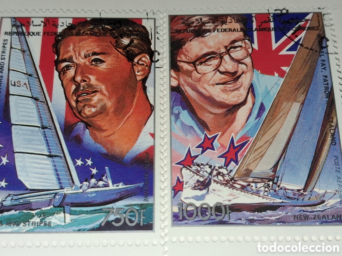 Sellos: Sello Comoras nuevo 1988. Personajes. Conner, velero. Michael Bay. Bandera. Barco. Yate. Regata. Tur
