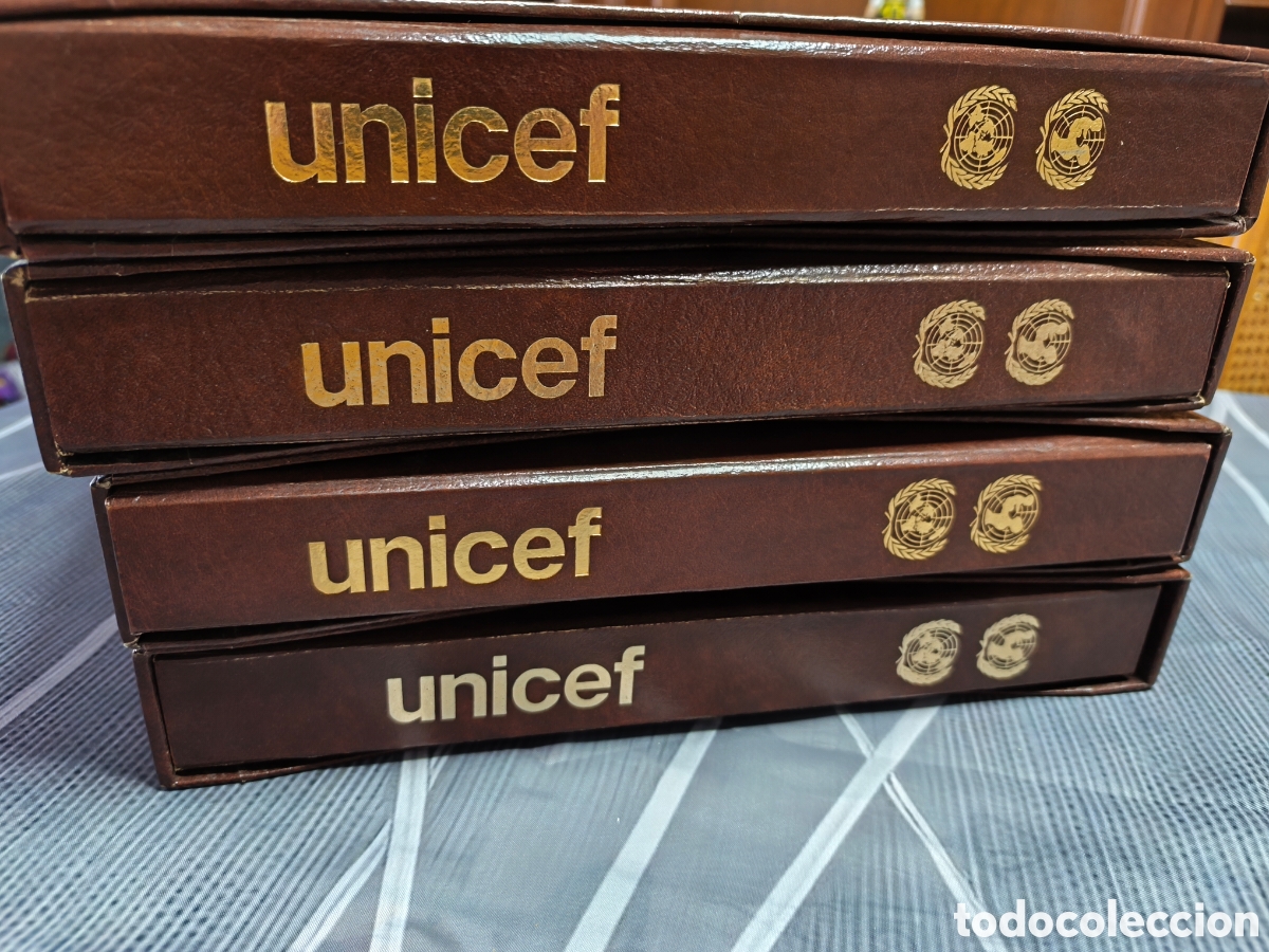 Sellos: 4 ALBUMS DE SELLOS UNICEF - BANDERAS DE LAS NACIONES UNIDAS (EN ALEMAN)