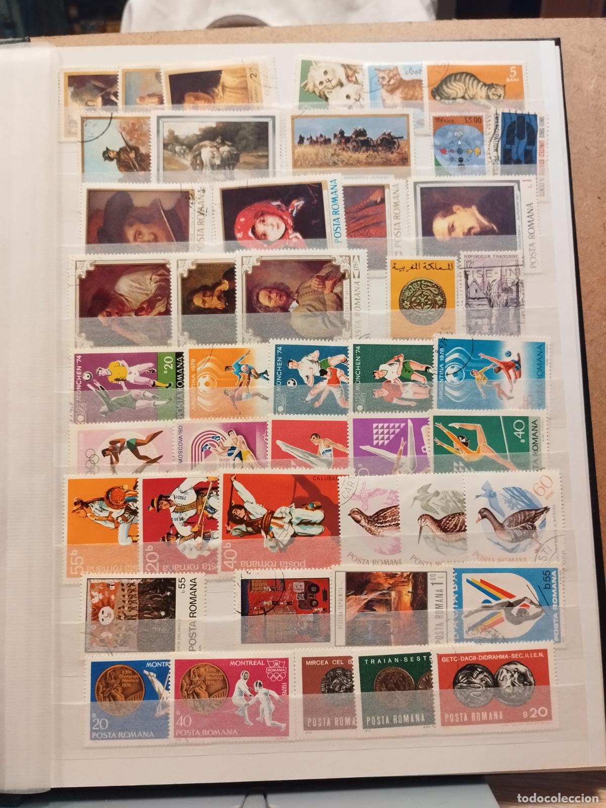 Briefmarken: DAR 16 - CLASIFICADOR DE 8 HOJAS CON CIENTOS DE SELLOS EXTRANJEROS. VER FOTOS.