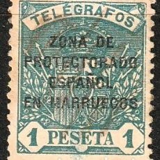 Sellos: MARRUECOS ESPAÑOL EDF Nº22.SELLO CON FIJASELLOS.MH.1PTA.AZUL.HABILITADO.1923-27
