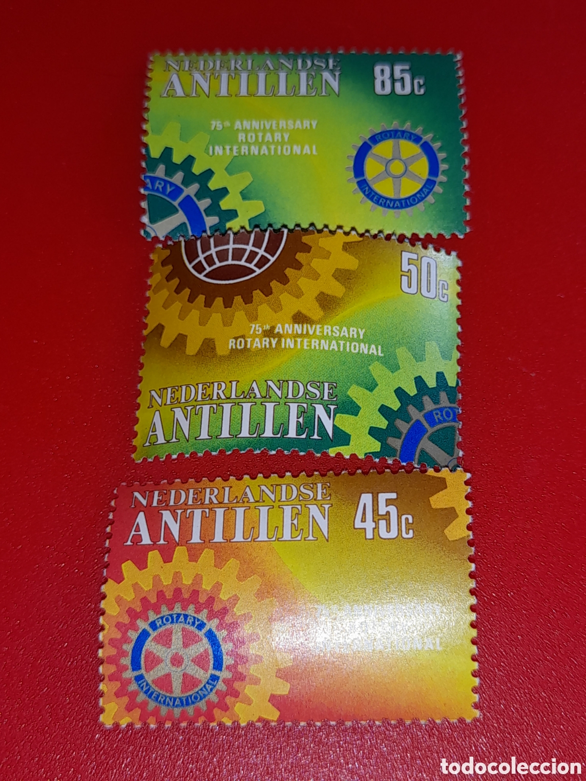 Selos: Sello Antillas Holandesas nuevo 1980. 75Aniv Rotatorio inter. Engranaje. Globo. Organizaciones.
