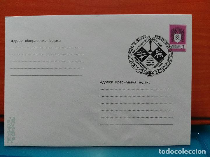 Timbres: AJEDREZ. UKRAINA SOBRE ENTERO POSTAL MATASELLOS DE AJEDREZ 2002