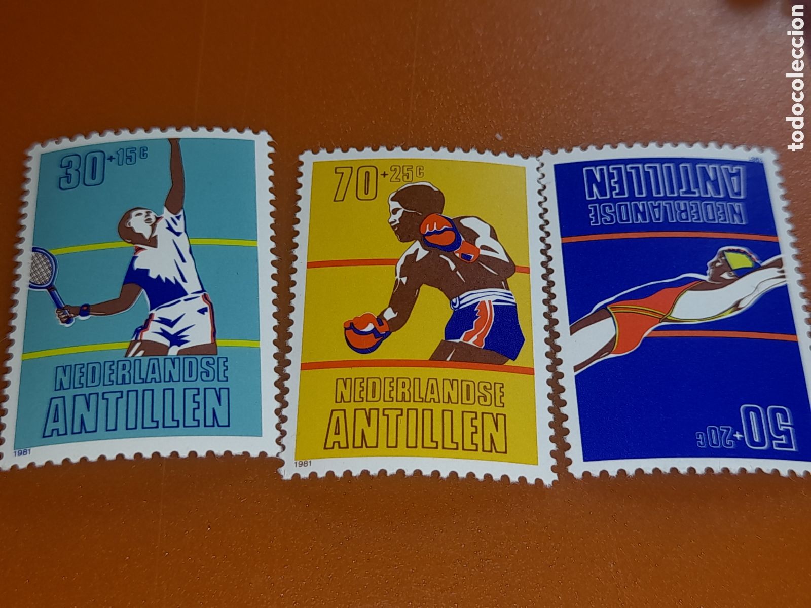 Sellos: Sello Antillas Holandesas nuevo 1981. Deportes. Juegos. Competici&oacute;n. Atletas. Tenis. Boxeo. Nataci&oacute;n