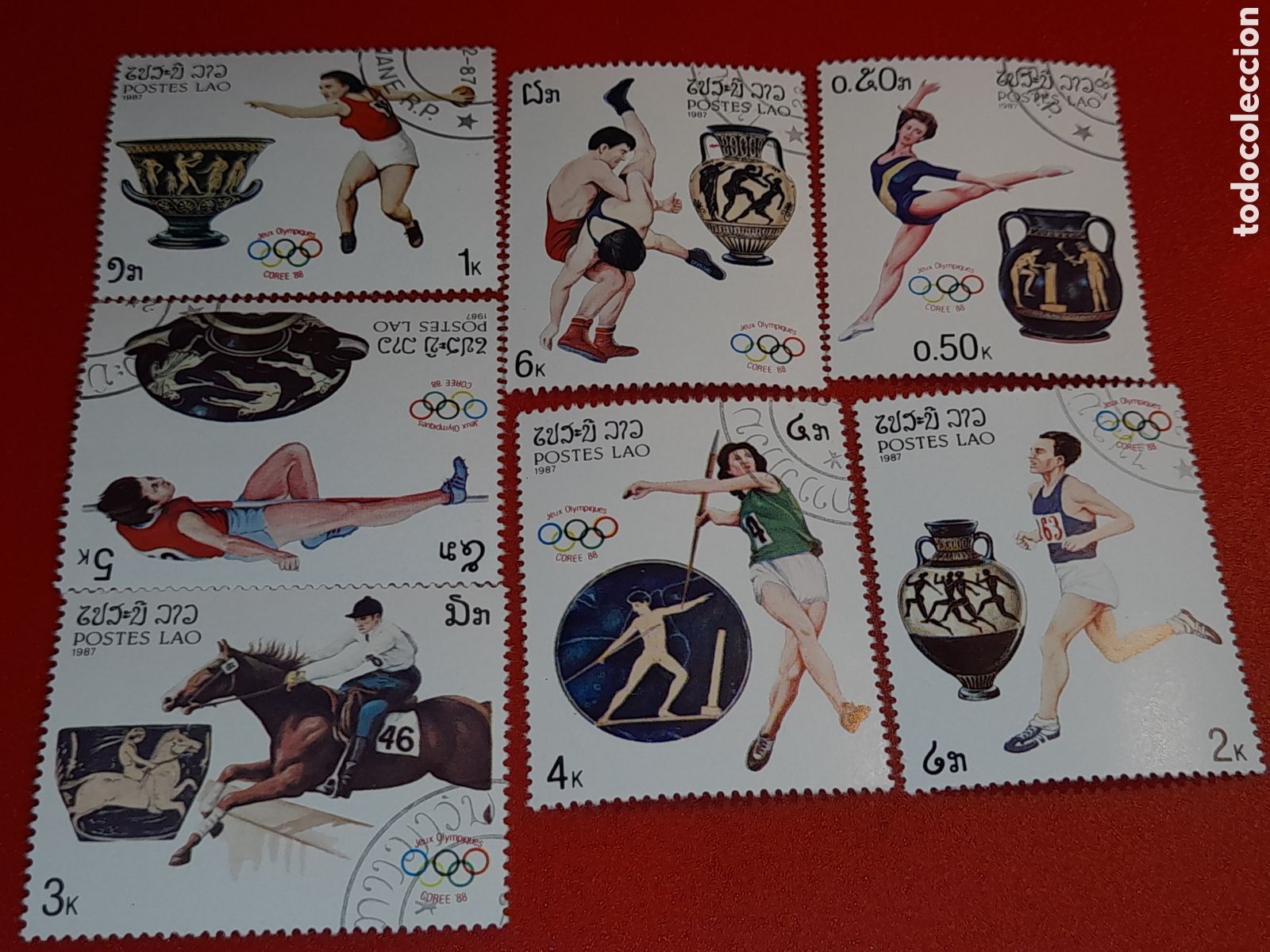 Sellos: Sello Laos mtdo 1987. Juegos olimpiada. Se&uacute;l. Deporte. Atletas. Jabalina. H&iacute;pica. Artesania. Judo