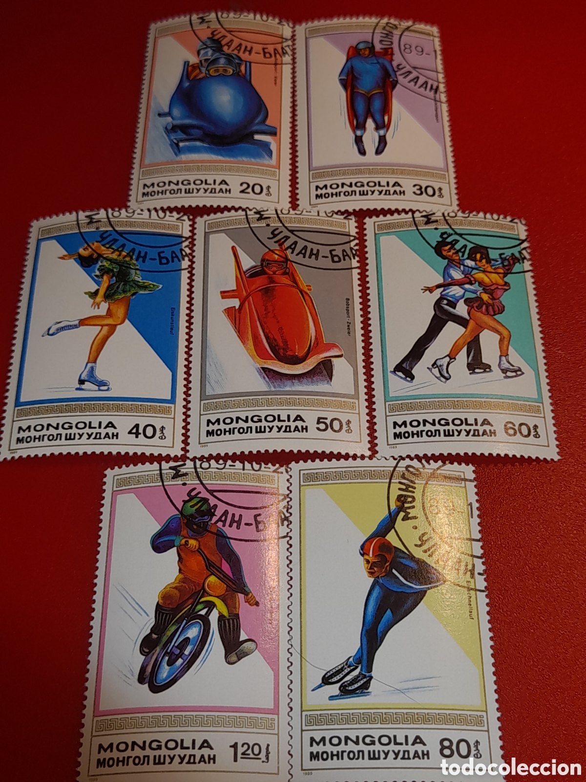 Sellos: Sello Mongolia mtdo 1989. Deportes invierno. Trineo. Motociclismo. Carreras. Patinaje art&iacute;stico.