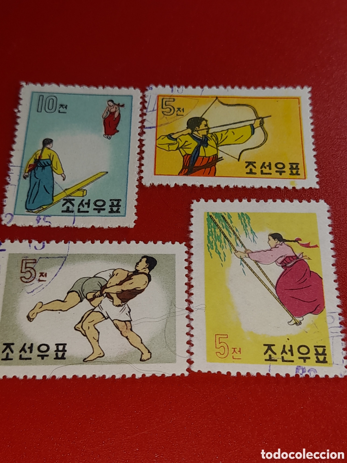 Sellos: Sello Corea Norte mtdo 1960. Deporte tradicioonal. Folclore. Constumbres. Arco. Tiro. Lucha. Columpi