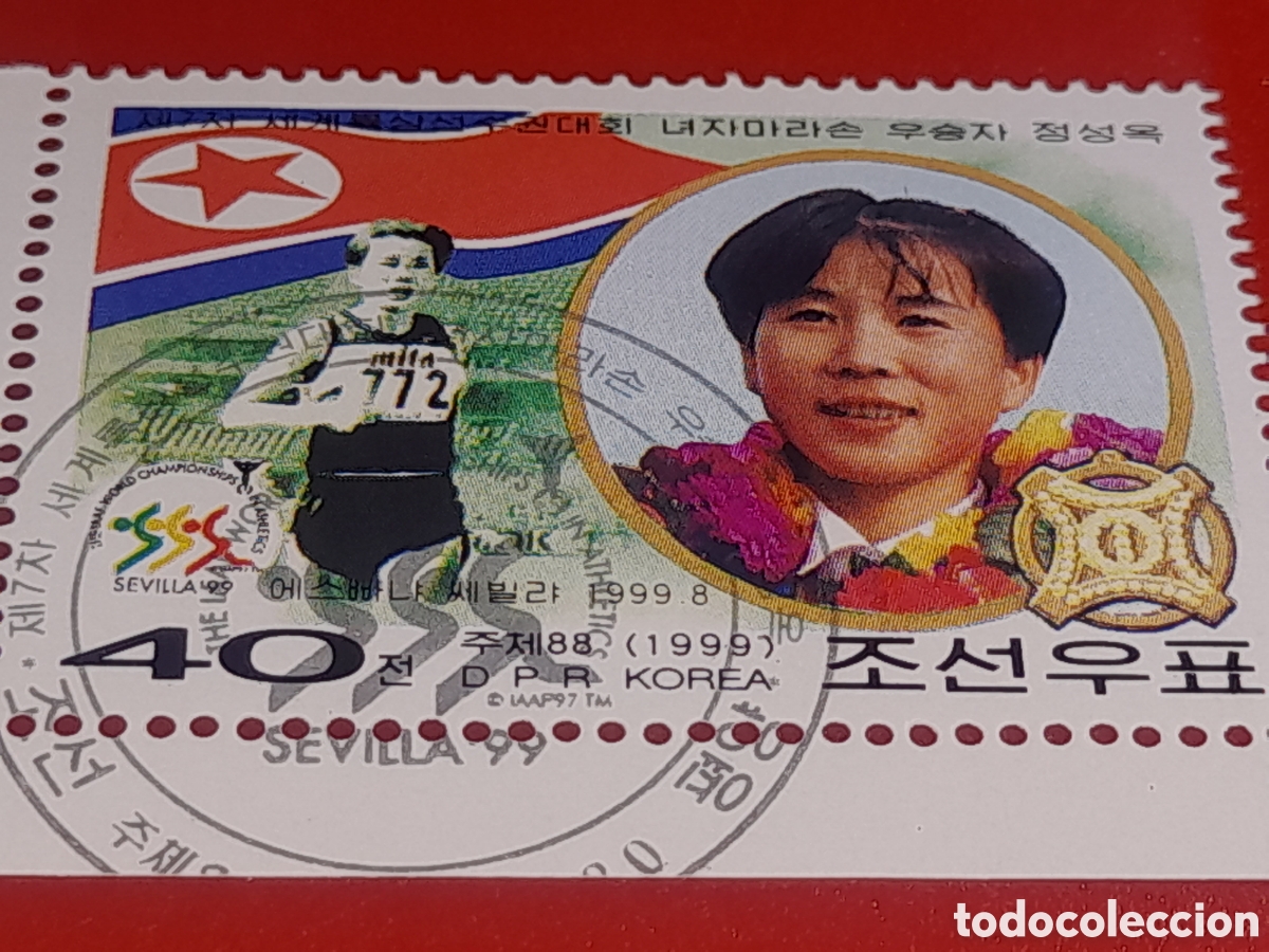 Sellos: Sello Corea Norte mtdo 1999. Victoria atleta norcoreana atletismo. Deporte. Bandera..carrera