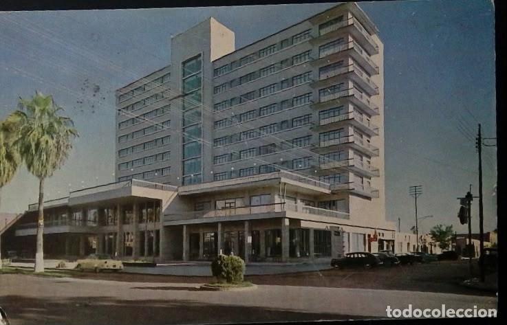 Sellos: KV)1970, MEXICO, VIEW OF A MODERN MULTISTORY HOTEL OR COMMERCIAL BUILDING WITH CONTEMPORARY ARCHITEC