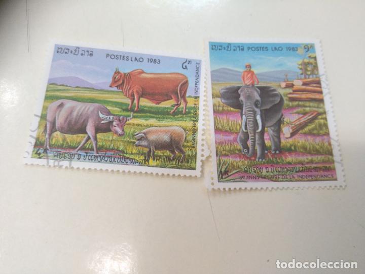 Briefmarken: LOTE DE 2 SELLOS USADOS ANIMALES, ELEFANTE, BUFALO. LAOS. POSTE LAO. 1983 STAMPS.