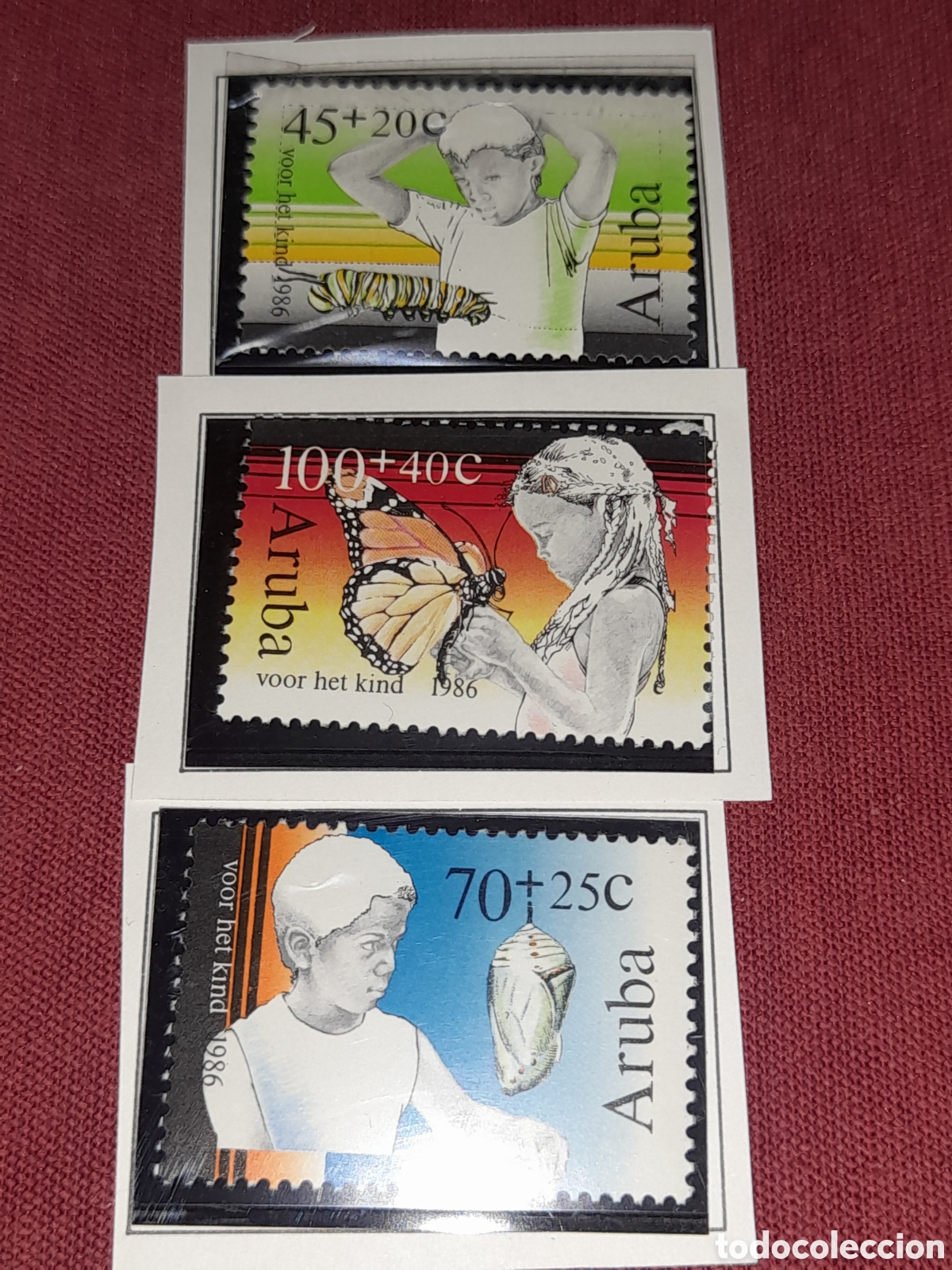 Sellos: Sello Aruba nuevo 1986. Pro infancia. Mariposa. Ni&ntilde;os. Insecto. Capullo. Metamorfosis. Gusano. Fauna