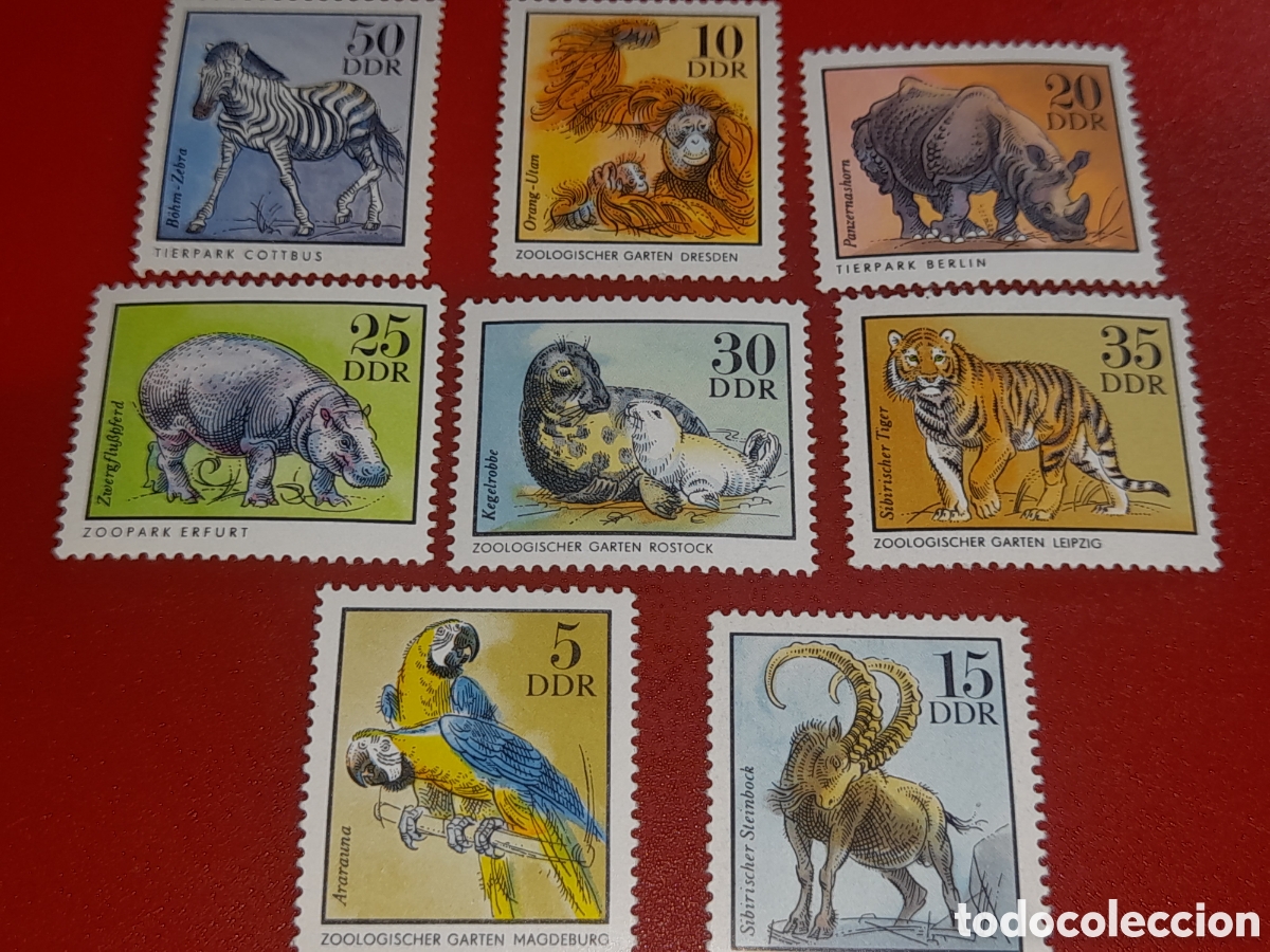 Sellos: Sello Alemania, DDR nuevo 1975. Animales parque zoo. Fauna. Guacamayo. Aves. Cebra. Rinoceronte. Leo
