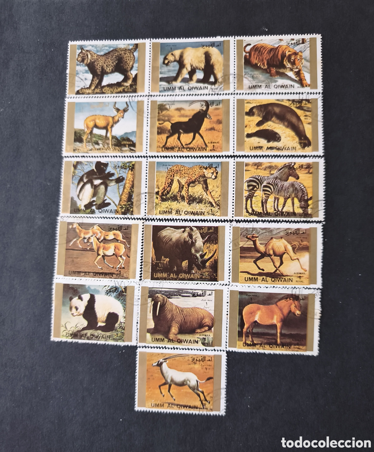 Sellos: 16 sellos de UMM AL QIWAIN