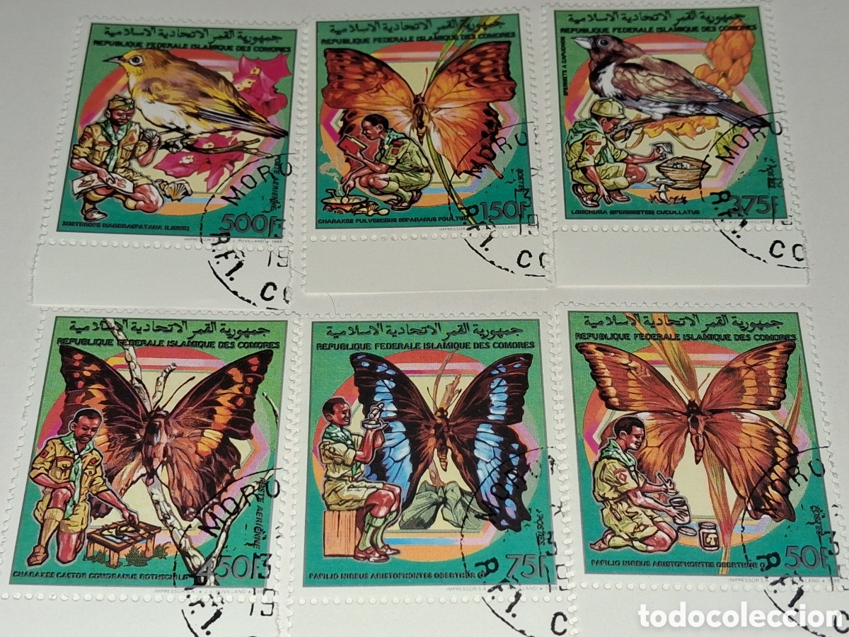 Sellos: Sello (2series) Comoras mtdo 1989. Mariposas. Scouts. Aves. P&aacute;jaros. Fauna. Polillas. Organizaciones