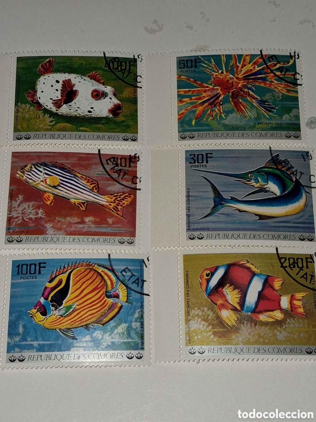 Sellos: Sello (2series) Comoras mtdo 1977. Peces. Pescado. Fauna, vida marina. Globo. Espada. Payaso. Arreci