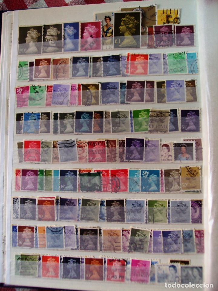 Timbres: Sellos Reina Inglaterra faciales unos 100 items