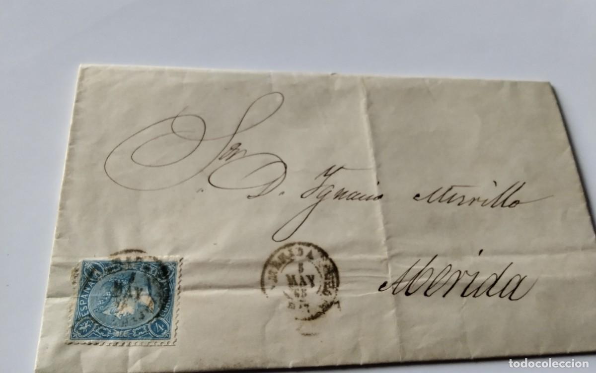 Sellos: BADAJOZ , ENVUELTA CIRCULADA A MERIDA A&Ntilde;O 1865 , FECHADORES DE BADAJOZ Y MERIDA