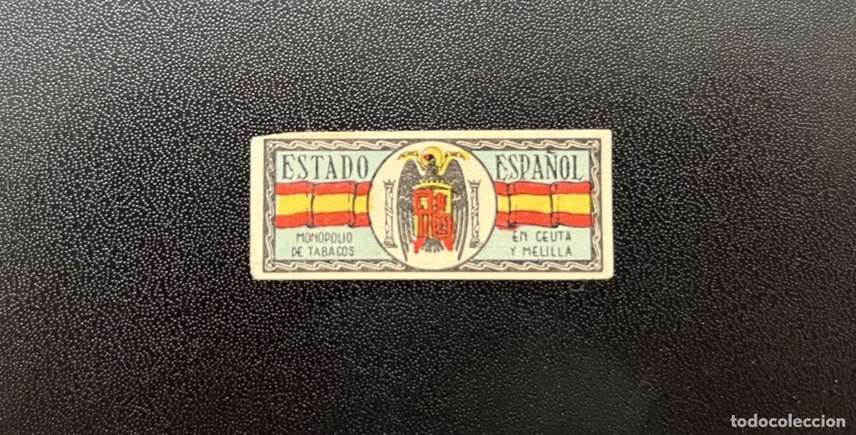 Sellos: Etiqueta.Monopolio tabaco en Ceuta y Melilla. Estado Espa&ntilde;ol Antiguos. &Aacute;guila San Juan