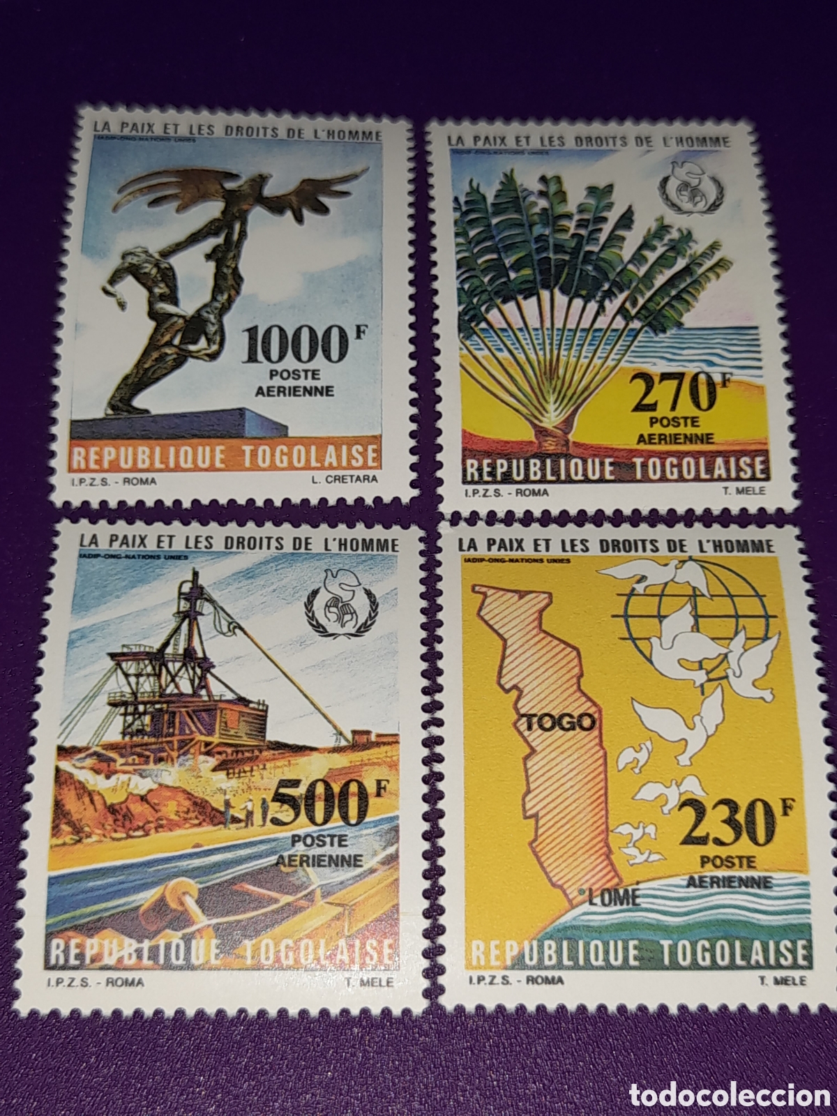 Sellos: Sello Togo nuevo 1985. Derechos humanos. Paz. Aves. Palomas. Arboles. Cartografia. Industria Estatua