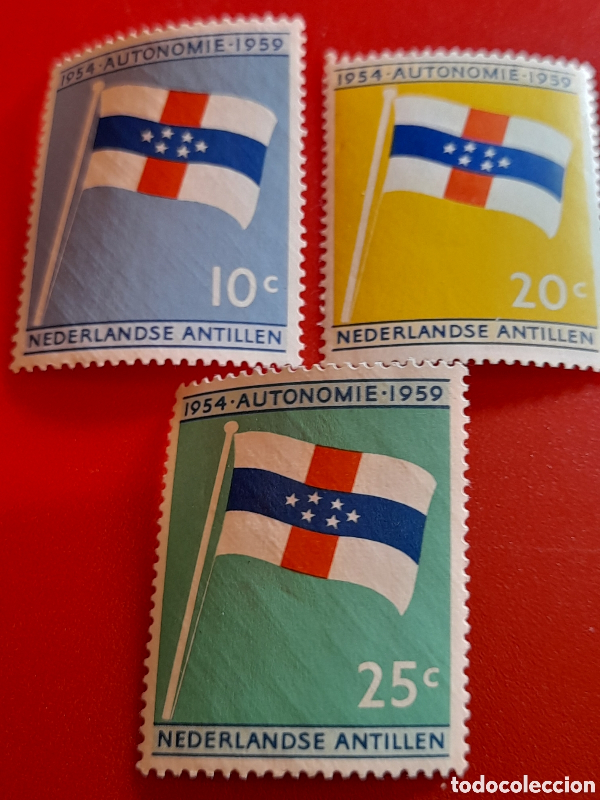 Sellos: Sello Antillas Holandesas nuevo 1959. 5Aniv Constituci&oacute;n. Bandera. Emblema. Estrellas. Historia