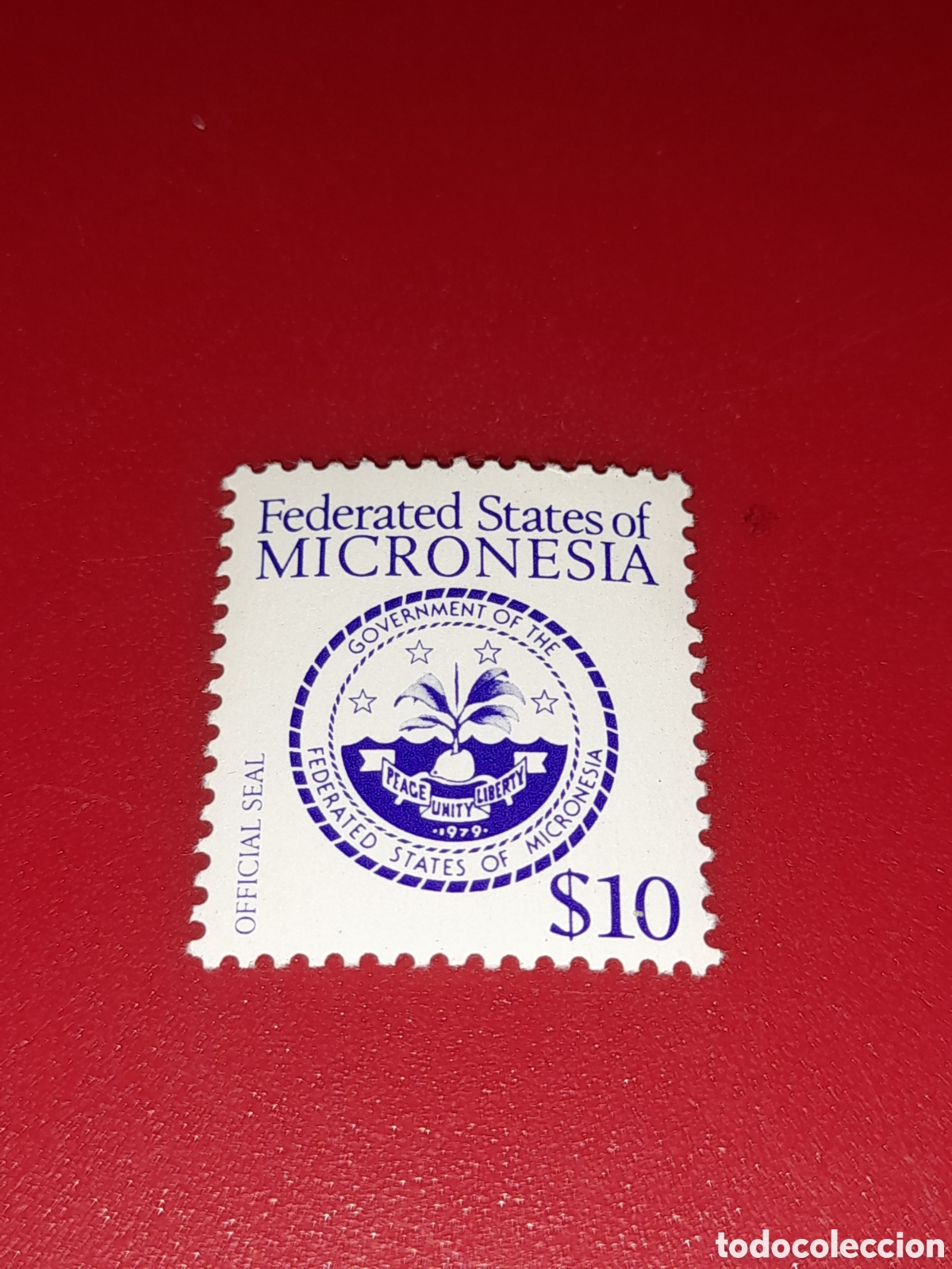 Sellos: Sello Micronesia nuevo 1985. Escudomarmas nacional. &Aacute;rbol?. Palmera.