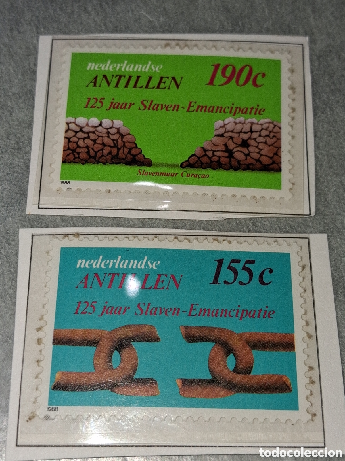 Sellos: Sello Antillas Holandesas nuevo 1988. 125Aniv abolici&oacute;n esclavitud. Cadenas. Muro. Piedras.