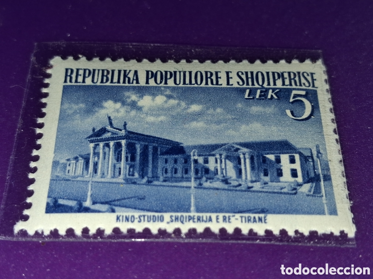 Timbres: Sello (1/8v) Albania nuevo 1953. Reconstrucci&oacute;n industrial. Arquitectura. Estudios cine Pelicuoas