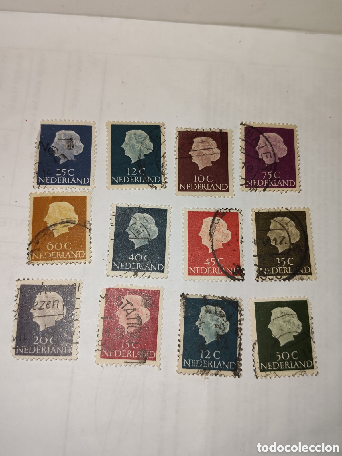 Sellos: 12 sellos de Holanda Reina Juliana 1950-60