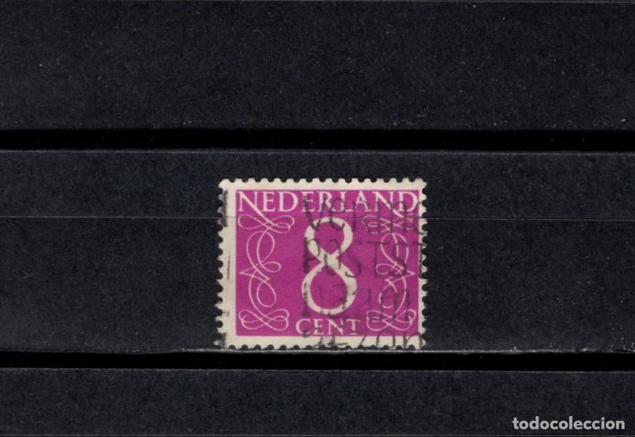 Sellos: Sello usado. Cifras. Sello de 8 centavos. 1957 abril. Yvert 612A.