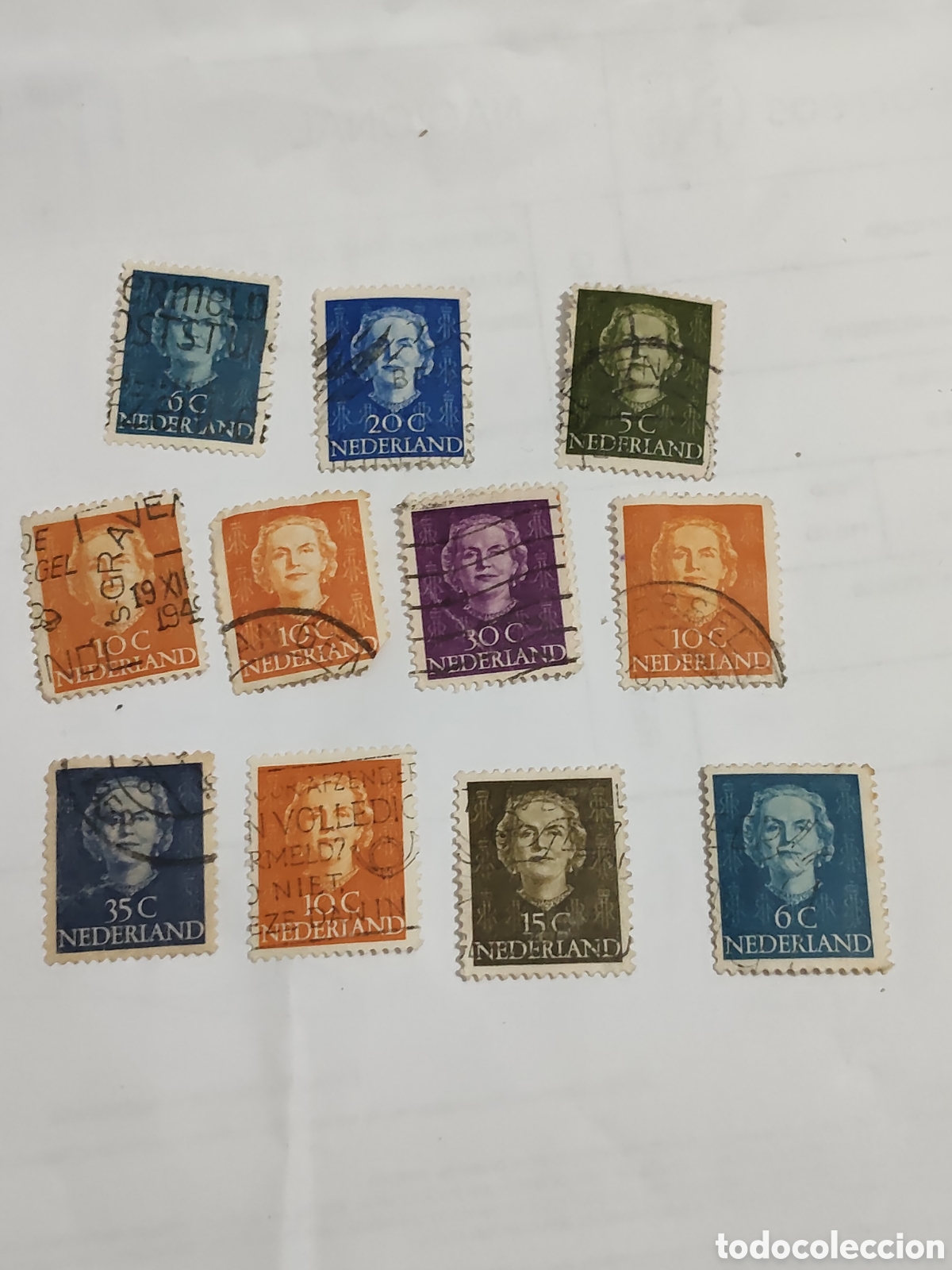 Sellos: 12 sellos de Holanda Reina Juliana 1949 usados