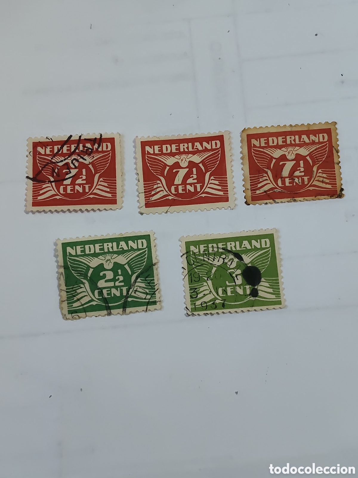 Sellos: 5 sellos de Holanda paloma mensajera 1925-30