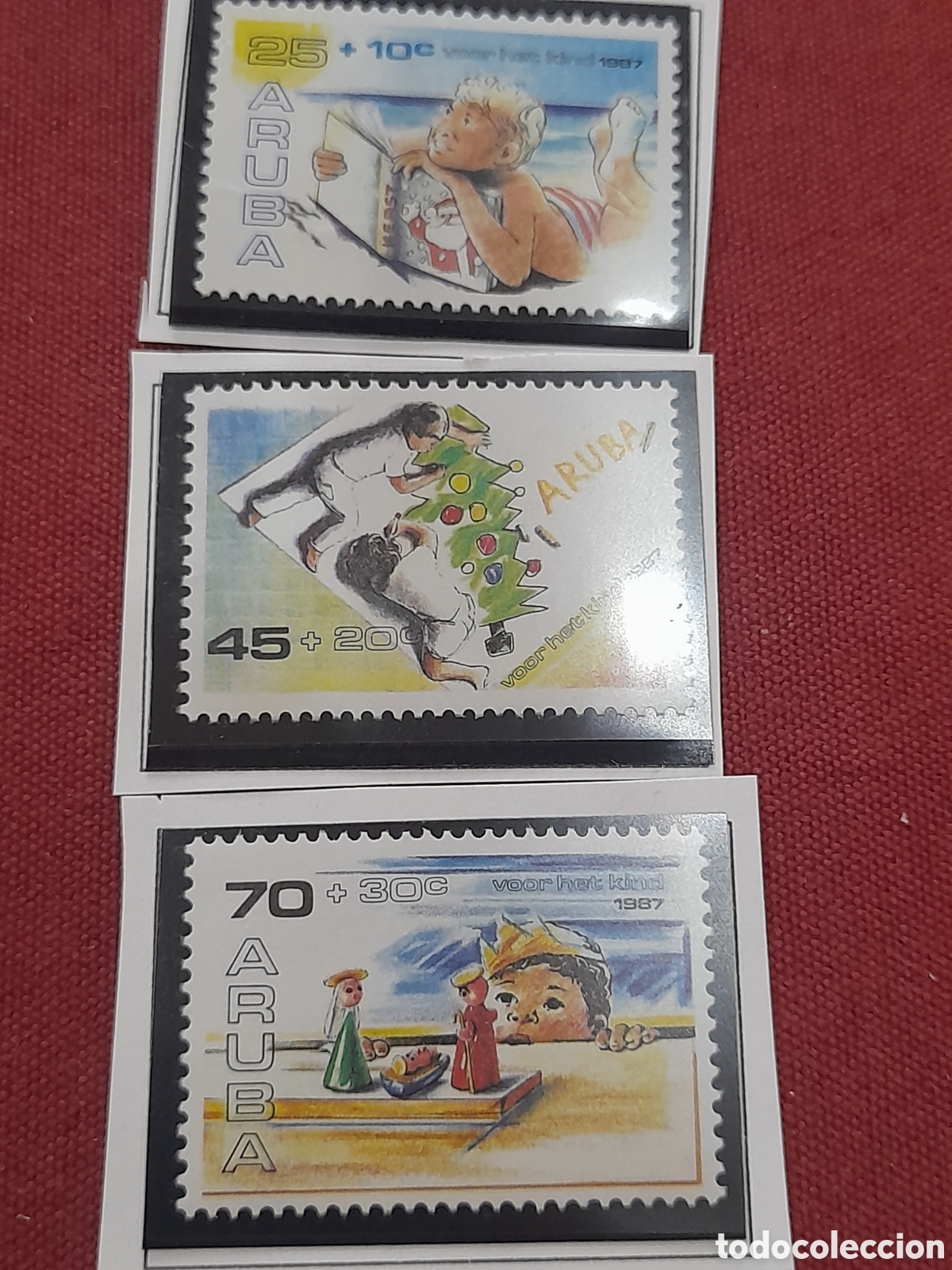 Sellos: Sello Aruba nuevo 1987. Pro infancia. Ni&ntilde;o leyendo librom laya. Navidad. Pintura &aacute;rbol. Ajedrez. Fig