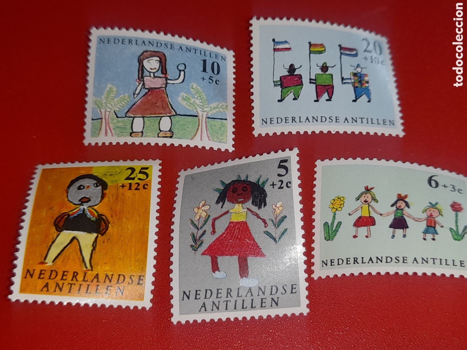 Sellos: Sello Antillas Holandesas nuevo 1963. Pro infancia. Dibujos. Pinturas. Banderas. Ni&ntilde;os. Naturaleza.