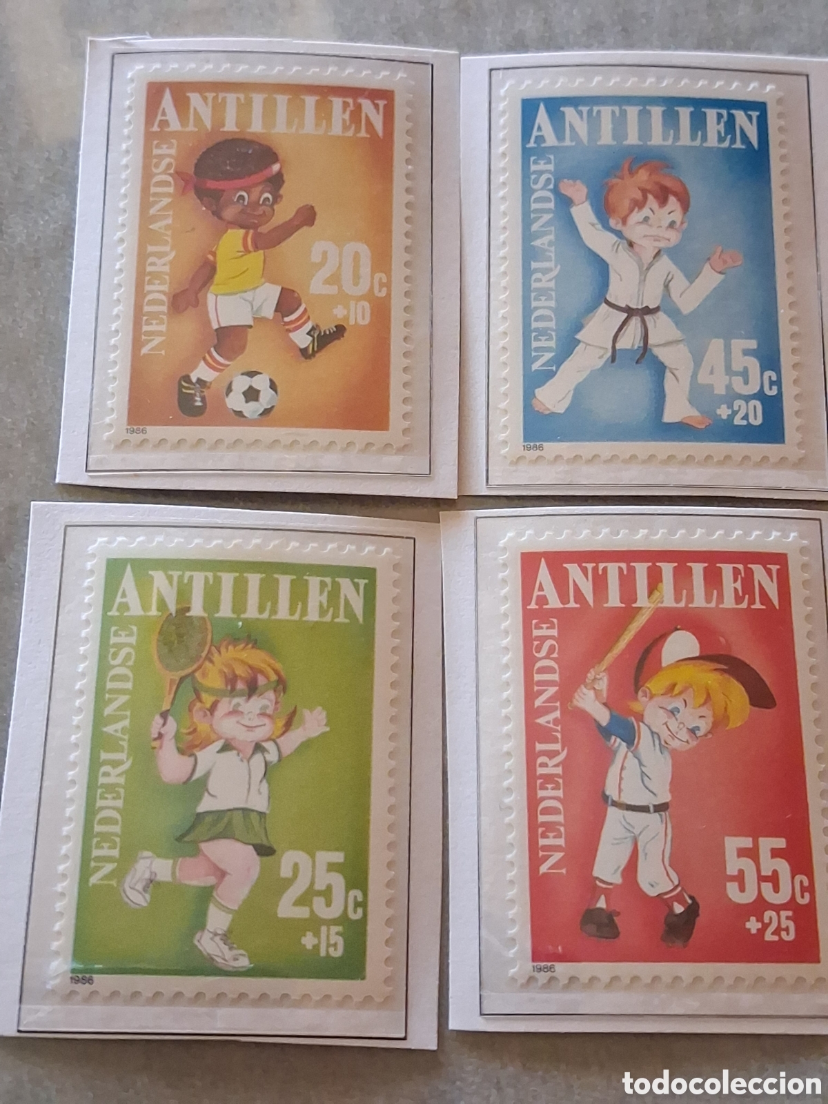 Sellos: Sello Antillas Holandesas nuevo 1986. Pro infancia. Deporte. Juegos. Judo. Tenis. Ni&ntilde;os. Golf.