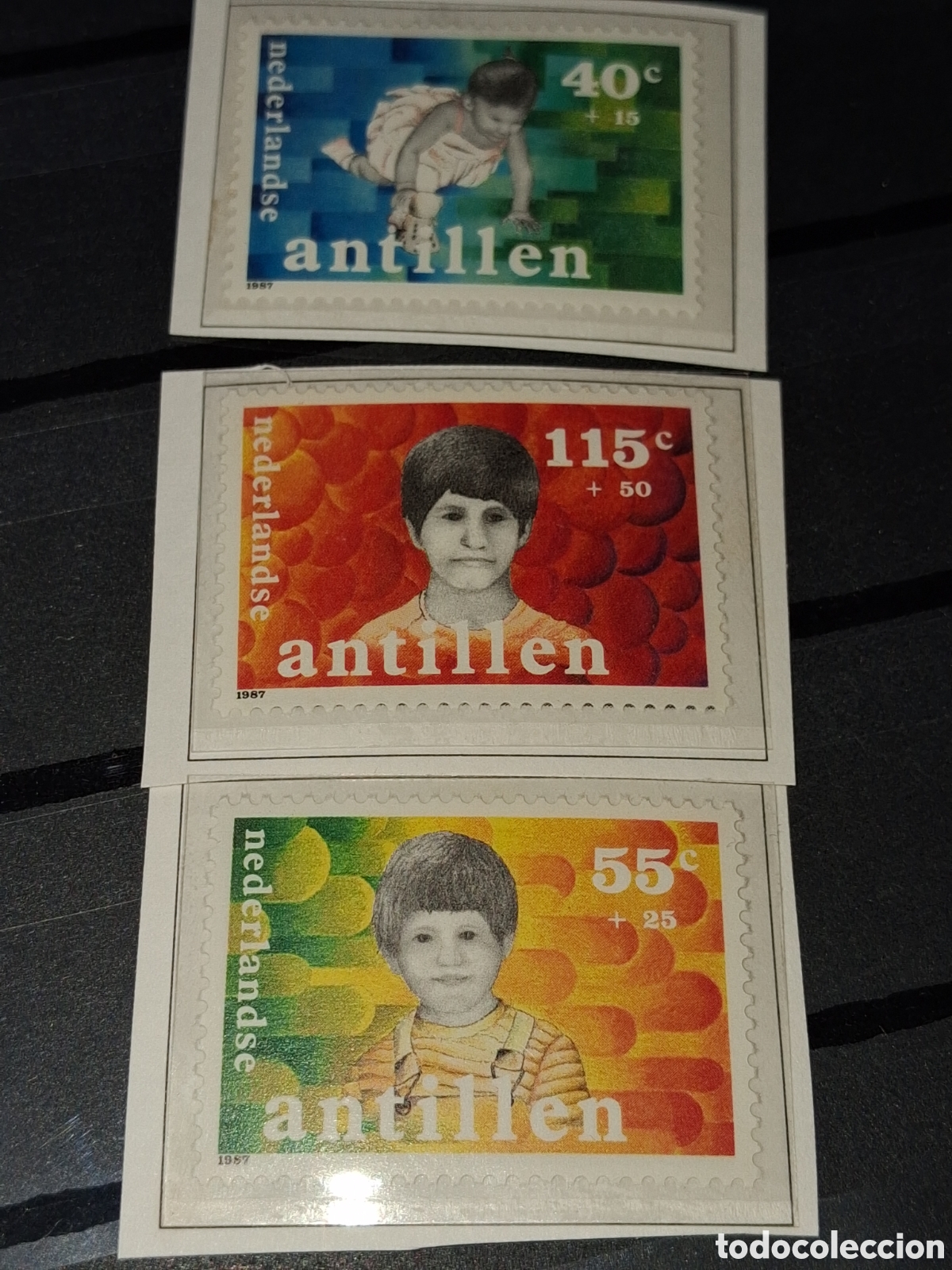 Sellos: Sello Antillas Holandesas nuevo 1987. Pro infancia. Ni&ntilde;os. Juegos. Colores. Bienestar.