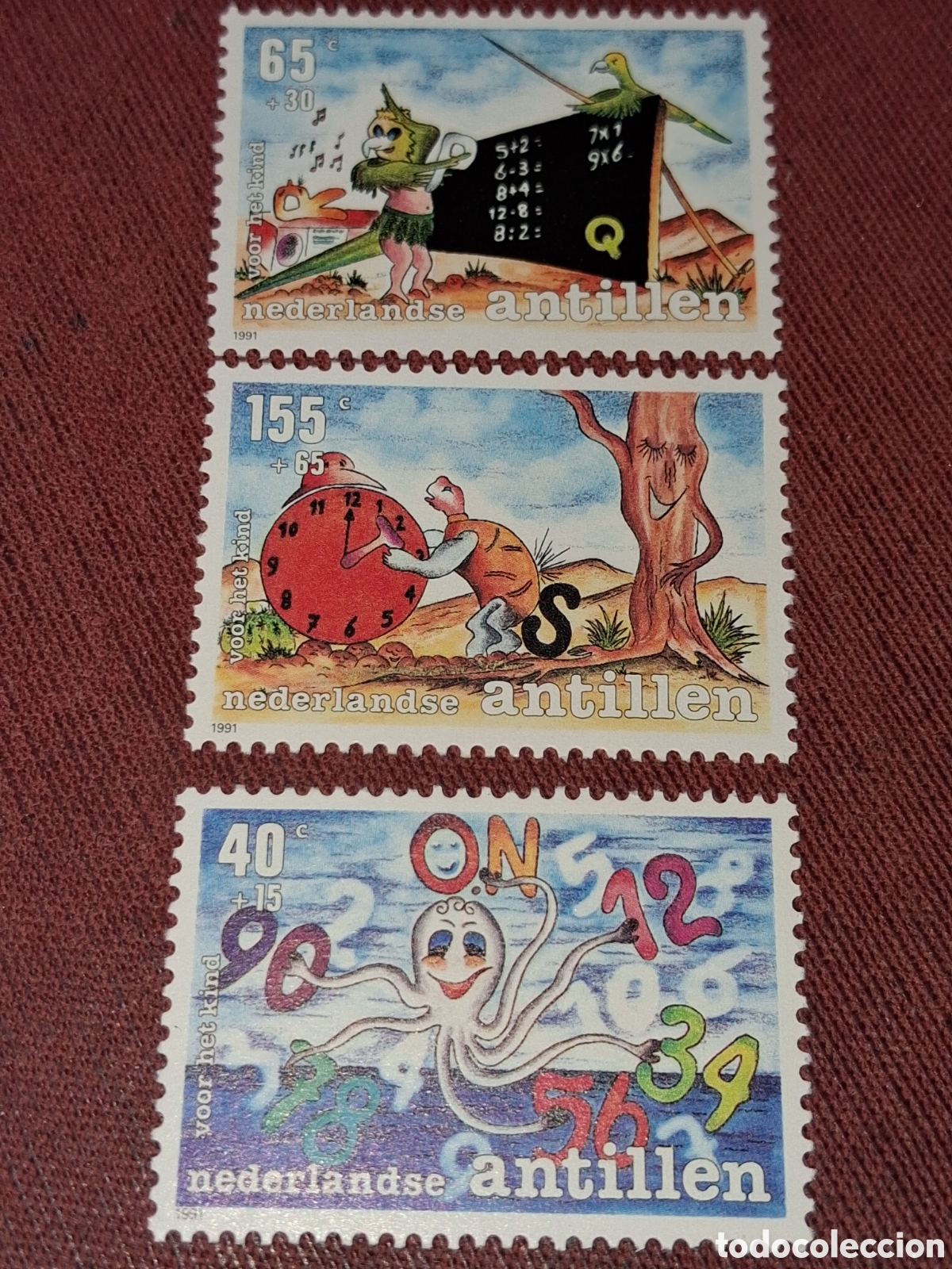Sellos: Sello Antillas Holandesas nuevo 1991. Pro infancia. Educaci&oacute;n. Cultura. Pulpo. Pizarra. Fauna. Reloj