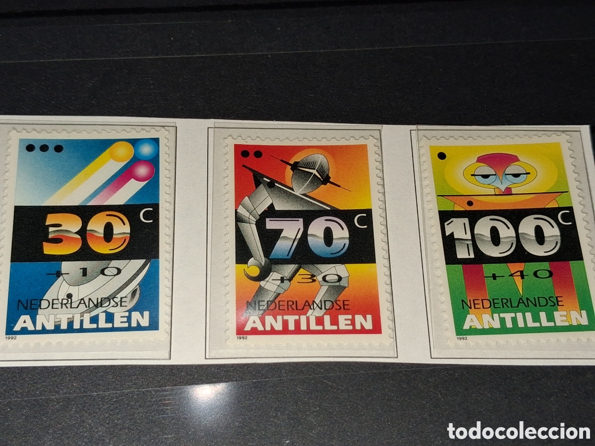 Sellos: Sello Antillas Holandesas nuevo 1992. Pro infancia. Ciencia ficci&oacute;n. Robot. Platillo. Ovni. Extrate