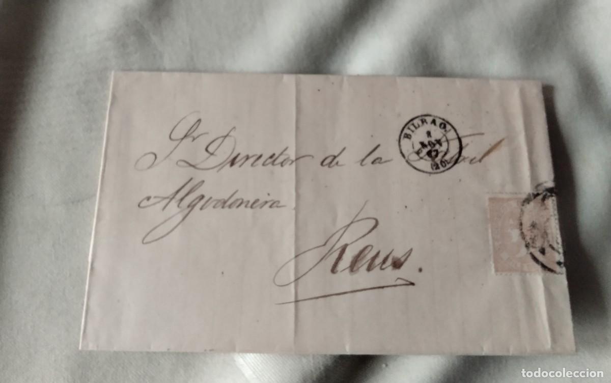 Sellos: REUS , ENVUELTA CIRCULADA DESDE BILBAO A&Ntilde;O 1867 , FECHADORES , SELLO DE ISABEL 2&ordf;