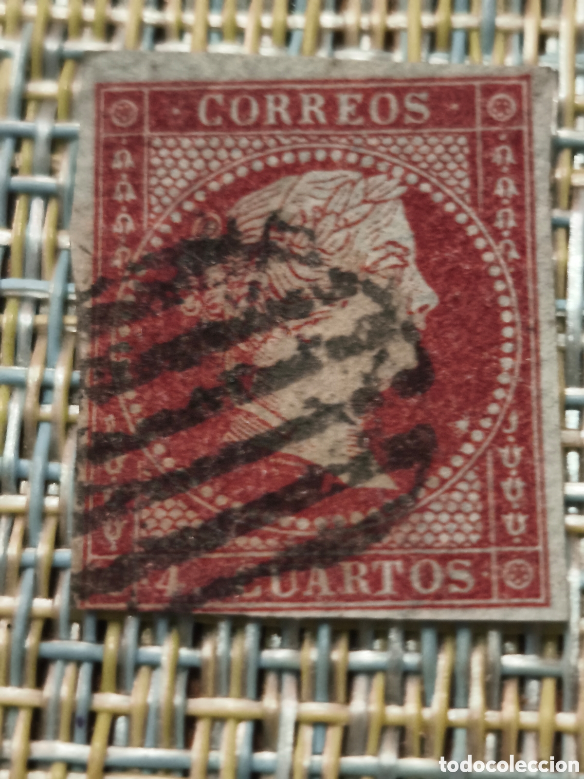 Sellos: Sello cl&aacute;sico Espa&ntilde;a papel azulado filigrana lazos 4 cuartos granate usado parrilla ver