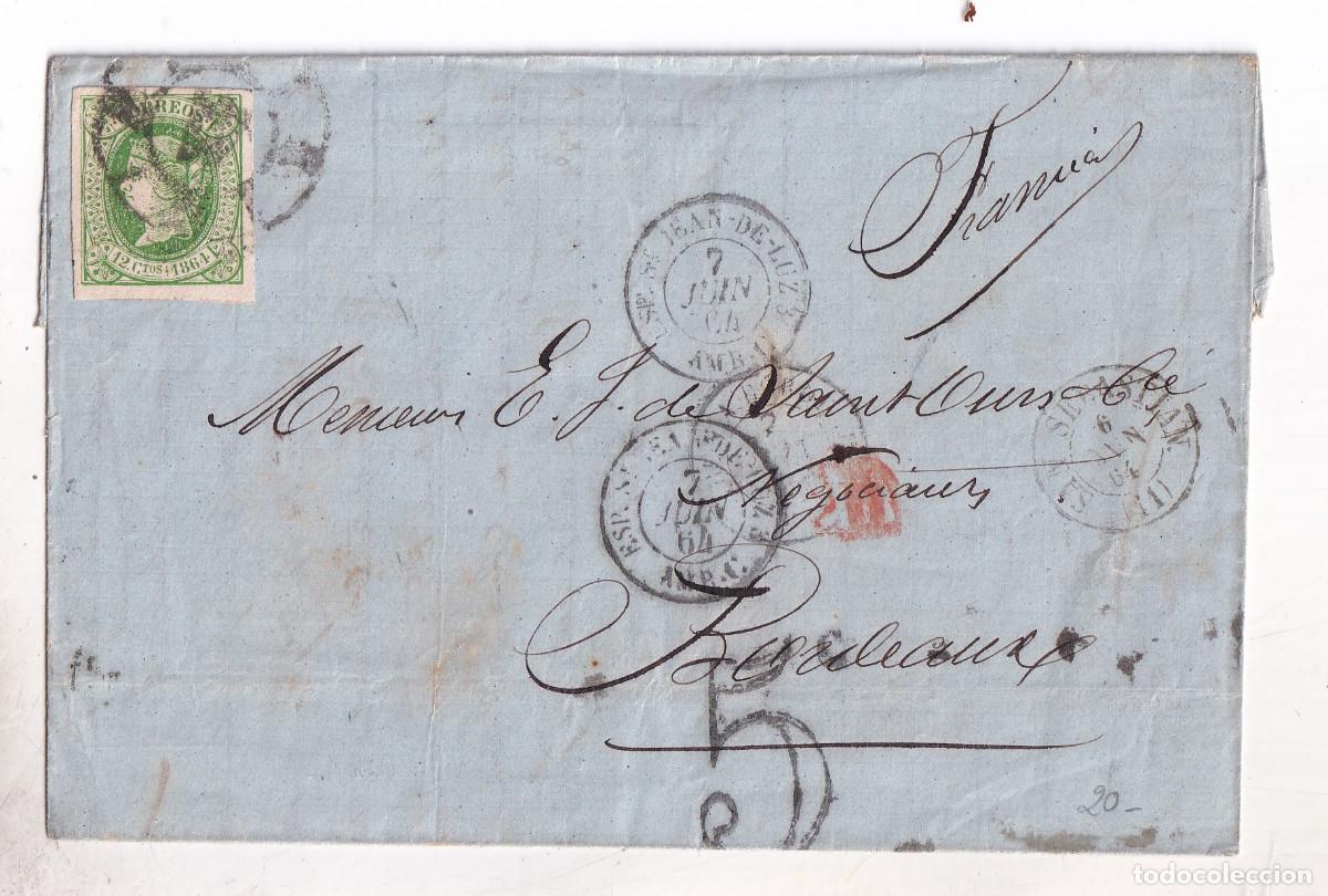 Sellos: ENVUELTA. SAN SEBASTI&Aacute;N A BURGOS. 1864. RUEDA DE CARRETA