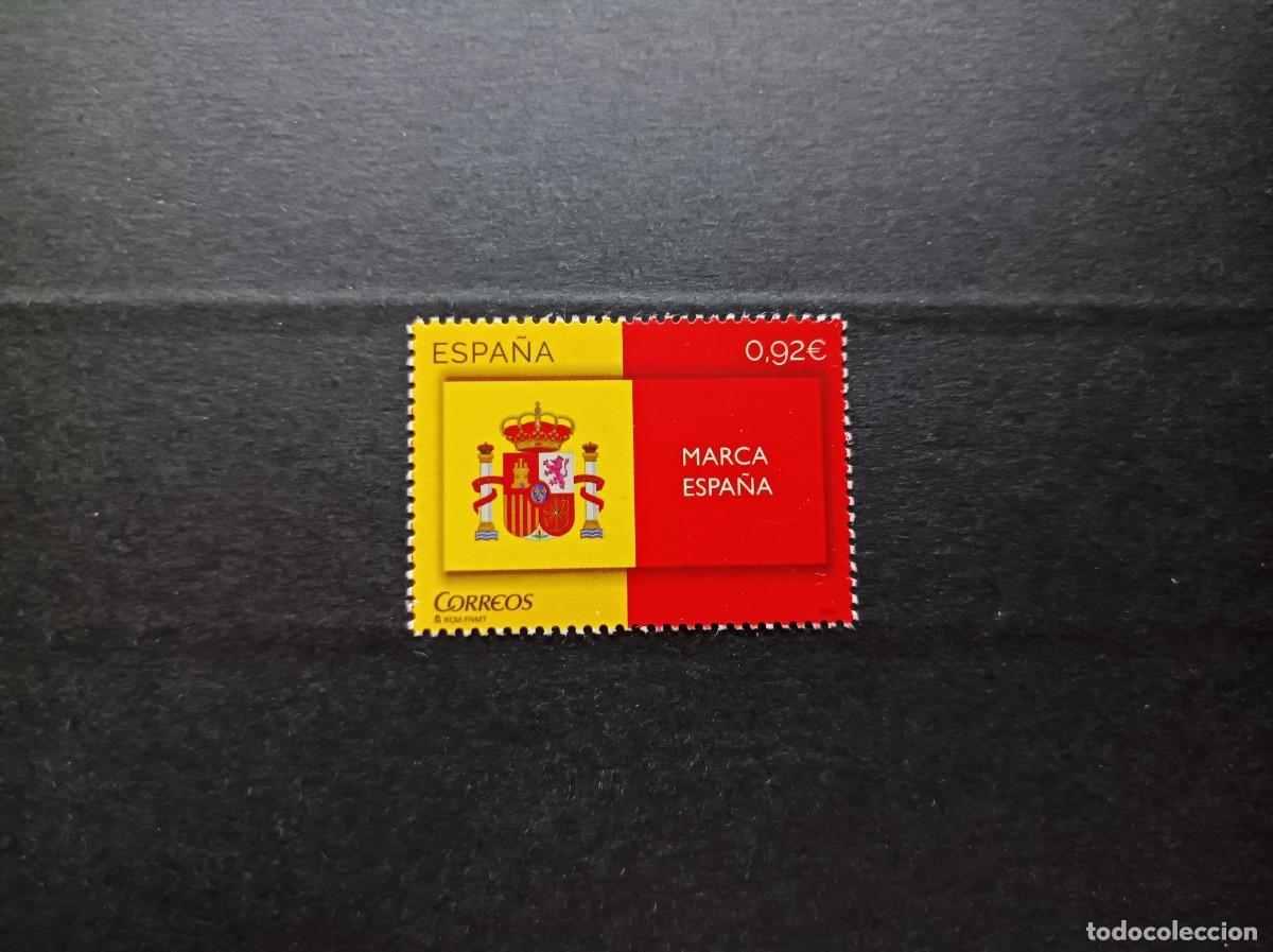 Sellos: Sello nuevo 2014. Marca Espa&ntilde;a. Bandera y Escudo. 25 de Marzo 2014. Edifil 4877.