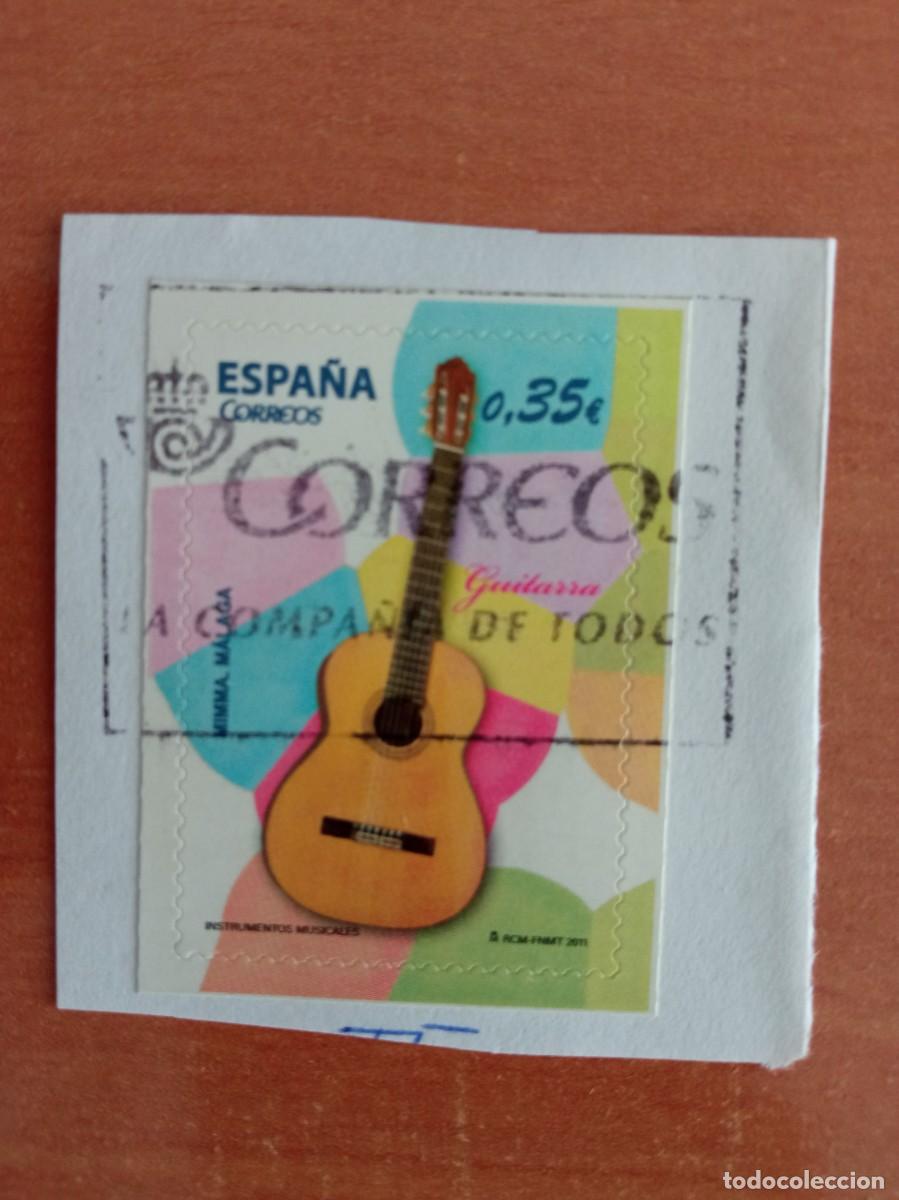 Sellos: 1 SELLO ESPA&Ntilde;OL, GUITARRA, PEGADO Y MATASELLADO